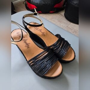 Black platform sandals in size 8